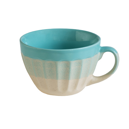 Handmade ceramic cup in blue and beige colors