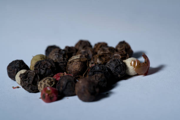 istock colorful peppercorns, black,white,red,green 2020338061