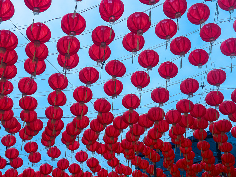 Chinese lantern decorations are installed during Chinese New Year