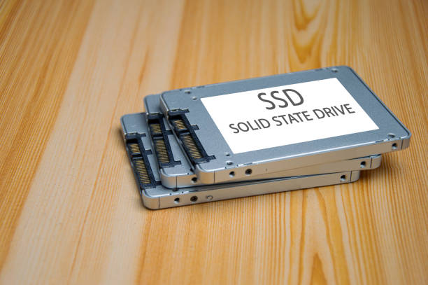 istock SSD disk drive placed on wooden surface, high speed SSD, SSD sata port 2020359340