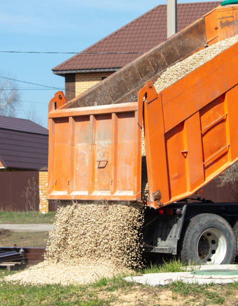 istock Truck pours rubble on the ground. 2020383292