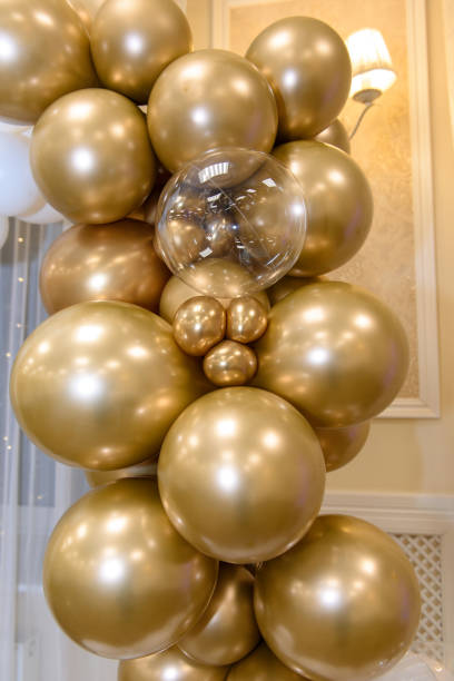 istock Helium balloons are dense yellow round. 2020406329