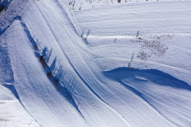 istock Aerial drone view of nature snow patterns and background 2020419564