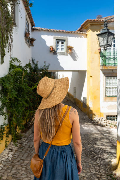 istock A woman visiting Obidos in Portugal. 2020420102