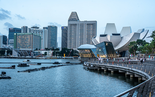 Singapore, 26 January 2024: From Jubilee Bridge, panoramic view showcases Marina Bay beauty, ArtScience Museum and towering hotels. architectural modernity of Singapore waterfront urban panorama