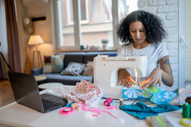 istock Freelance seamstress working at home 2020435263