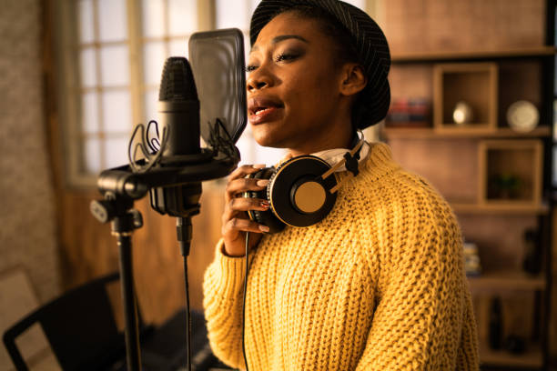istock Close up of a professional singer and microphone 2020451819