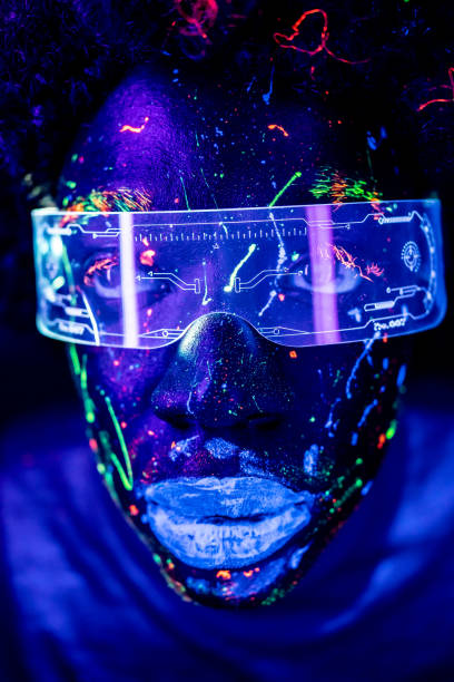 istock UV coloured male face cyber glasses 2020467926