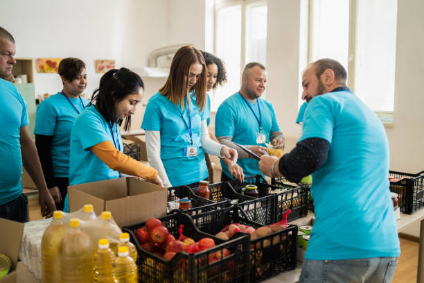 istock A team working together organizing grocery donations 2020474326