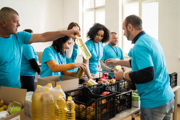 istock Volunteering in a community food bank 2020474340