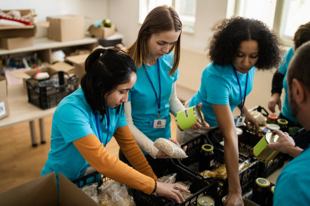 istock Charitable people in a donation center 2020474347
