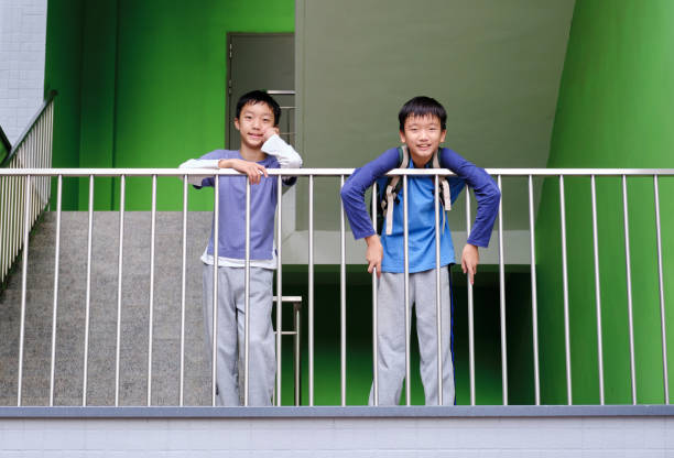 Little boy climbing up the stairs