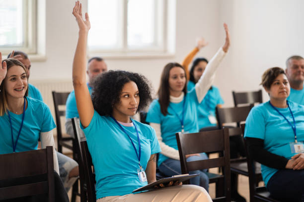 istock Volunteers volunteering in a group meeting 2020482380