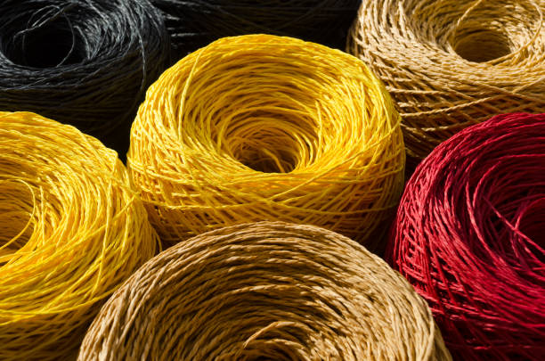 istock Rolls of colored raffia close-up. Eco material for handmade work. 2020485561