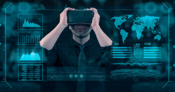 istock Young businessman using VR glasses with digital media interface.She’s working on a new project. She looks very busy. Blue hologram. Analytics. Virtual reality technologies for education GUI (Graphical User Interface) concept 2020491437