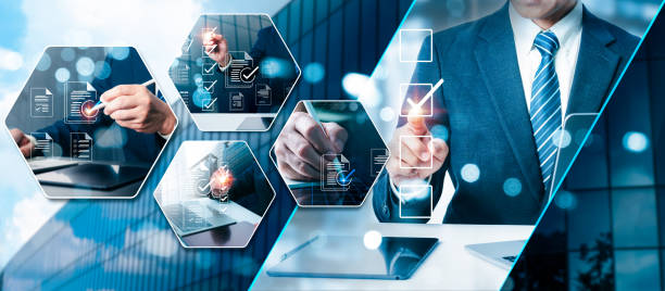 istock Task management with a checklist and clipboard, completing online survey forms To handle files effectively, corporate business technology uses process automation and document management systems (DMS). 2020505858