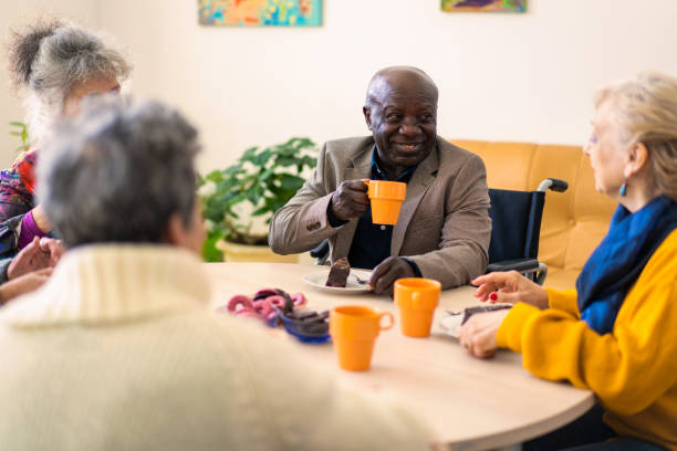 A group of pensioners enjoying a coffee break together