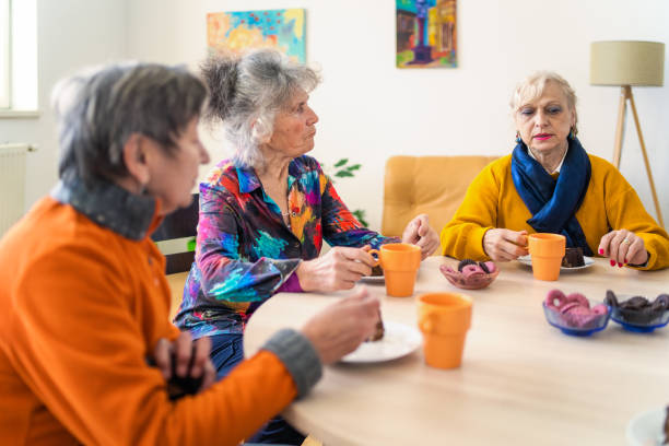 istock Three senior ladies enjoying a cup of afternoon tea 2020509657