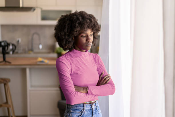 istock African-american woman looking sad 2020514890