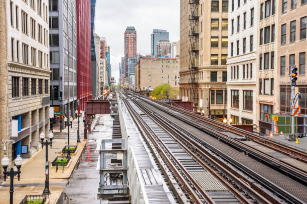 istock Deserted elevated railway in downtown Chicago on a rainy day 2020521859