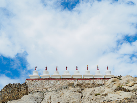 Small whites chortens standing horizontally at Shey Monastery, Leh Ladakh, India.