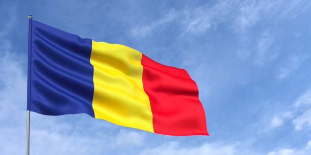 istock Romania flag on flagpole on blue sky background. Romanian flag waving in wind on a background of sky with white clouds. Place for text. 3d illustration. 2020544486