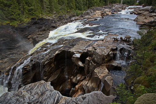 Waterfall Formofossen on the river Sandola at Formofoss in Norway, Europe