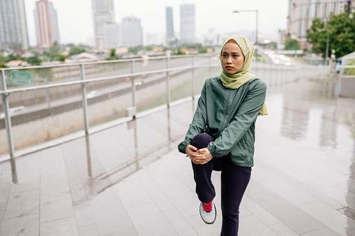 South East Asian woman exercising