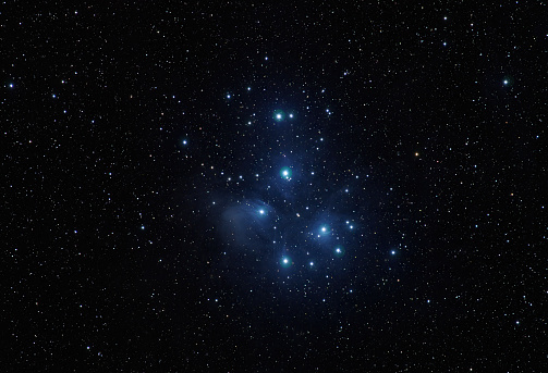 The Pleiades, known as the Seven Sisters, Messier 45. Image was shot using a remote telescope service.