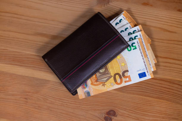 wallet containing a wad of 50 euro notes