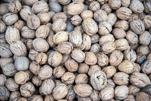 Shelled walnuts on the market stall