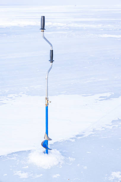 A man enjoys winter fishing.
