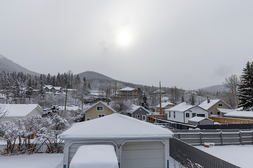View past community in fresh snow on winter day