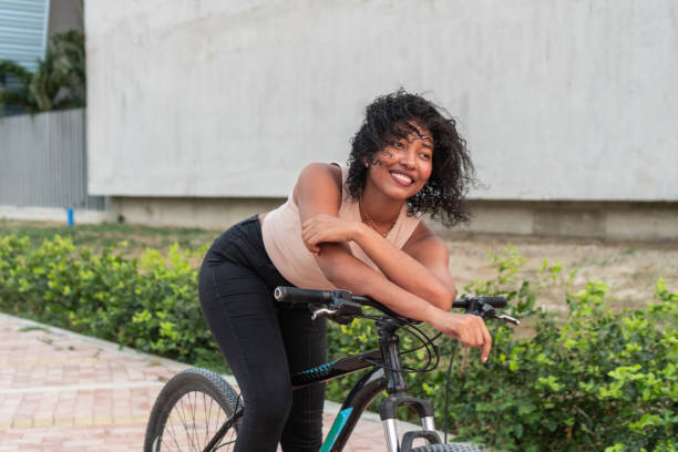 istock Cheerful Cyclist Leaning on Bicycle Enjoying the Moment 2020753528