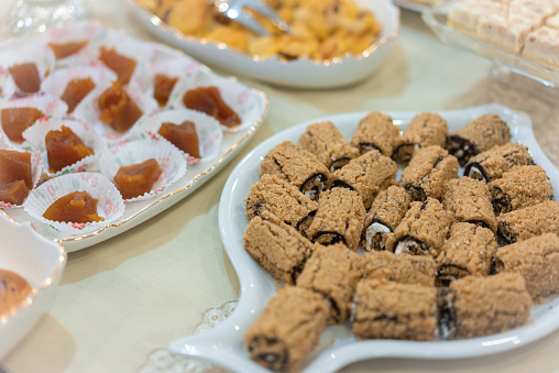 Table with various Turkish cookies, tarts, cakes