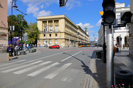 Warsaw, Poland - September 1, 2023: The intersection of Nowy Swiat and Swietokrzyska streets in the city centre. There is little traffic, just a few cars and buses a little further away.