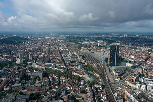 The City of Brussels is the capital of Belgium and also the administrative centre of the European Union. The image shows the City with residential and office buildings,  captured during summer season.