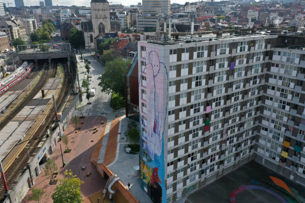 The City of Brussels is the capital of Belgium and also the administrative centre of the European Union. The image shows the City with some residential buildings, captured during summer season.