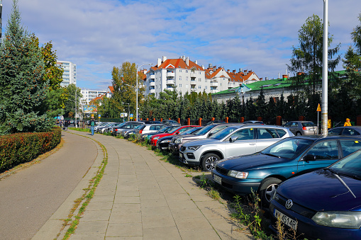 Pitești, Argeș County, Romania - March 18, 2023: Cars parked in the town centre of Pitești, Romania.