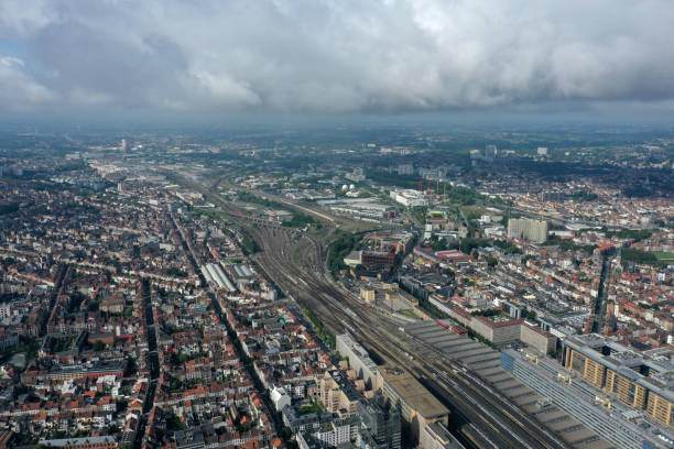 The City of Brussels is the capital of Belgium and also the administrative centre of the European Union. The image shows the City with a residential district and some office buildings, captured during summer season.