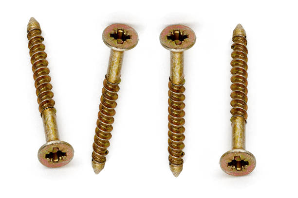 istock Golden screws on white background isolated 2020848170