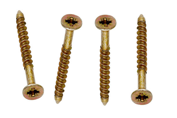 istock Golden screws on white background isolated 2020848172