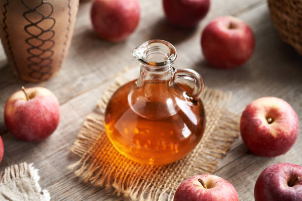 istock Apple cider vinegar in a glass bottle 2020871692
