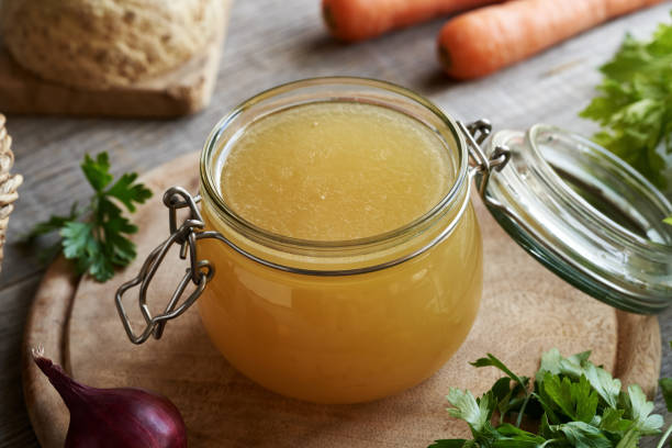 istock Homemade bone broth in a glass jar 2020871694