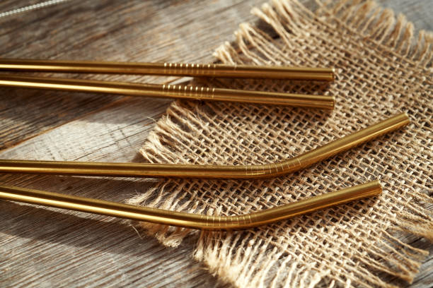 istock Gold colored ecological stainless steel straws. Zero waste. 2020874399