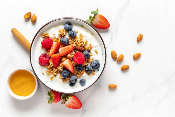 istock Healthy breakfast bowl top view Weight loss 2020911197