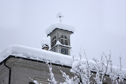 This is a chimney artfully bricked as a finishing touch on the house roof