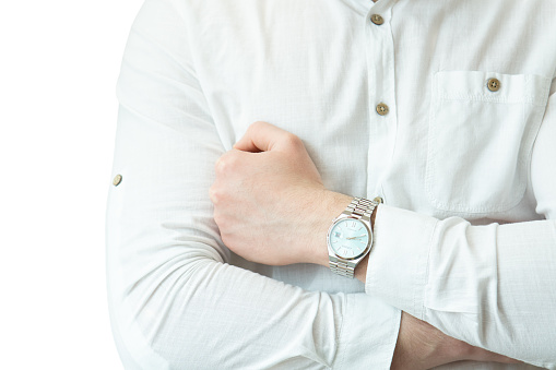 Businessman adjusting his wrist watch