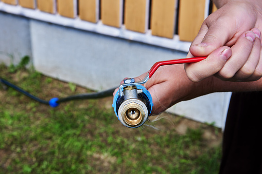 Using PP thread adapter to connect brass ball valve to polyethylene pipe for watering vegetable garden.