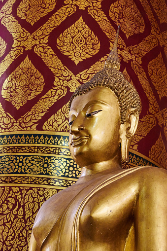 Ancient Buddha statue at Wat Phanan Choeng. Ayutthaya. Phra Nakhon Si Ayutthaya province. Thailand.